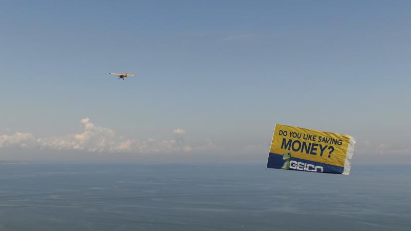 The Geico banner flies over Lewes Beach. ROB WATERS PHOTO